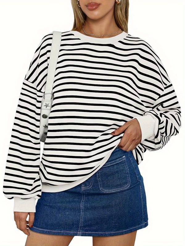 casual pullover top for women featuring a striped oversized design, long sleeves, and a crewneck hoodie, inspired by y2k fashion.
