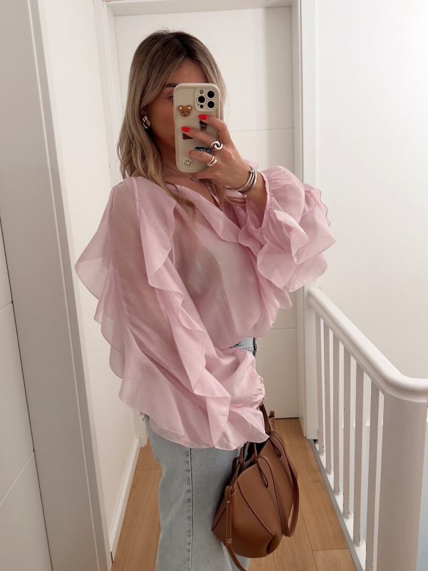 elevate your style game with our chic t shirt collection white, pink, and yellow options available, v neck, long sleeve, ruffle detail, all season wear, casual chic top|vneck tshirt|ruffle detail shirt