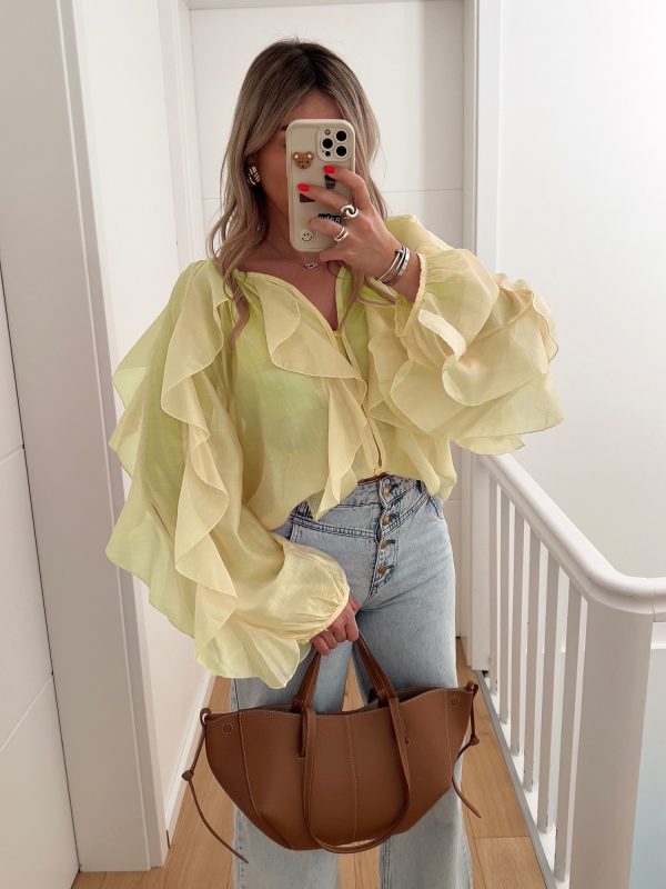 elevate your style game with our chic t shirt collection white, pink, and yellow options available, v neck, long sleeve, ruffle detail, all season wear, casual chic top|vneck tshirt|ruffle detail shirt